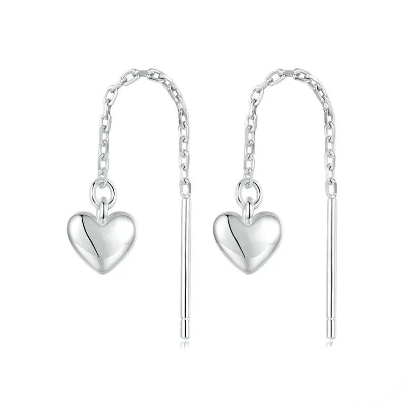 Boucles d'oreilles pendantes simples en forme de cœur avec longs pompons